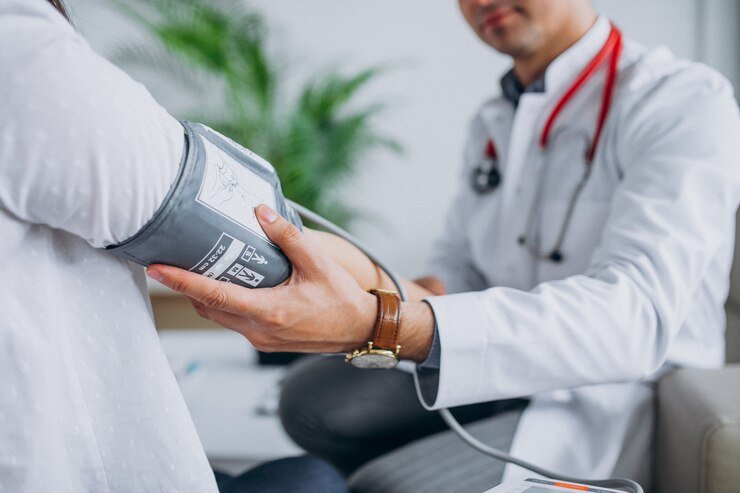 Doctor measuring blood pressure